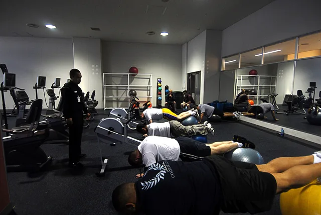 SASEBO, Japan (May 3, 2007) – Hospital Corpsman 2nd Class John Abasta, from Naval Branch Health Clinic Sasebo Japan, assists his patients during lumbar physical therapy at the Fleet Fitness Center in Sasebo. Abasta uses this technique to strengthen the muscles in the back to help alleviate back pain. 3 cash-pay physical therapy packages that work in high-deductible US insurance markets