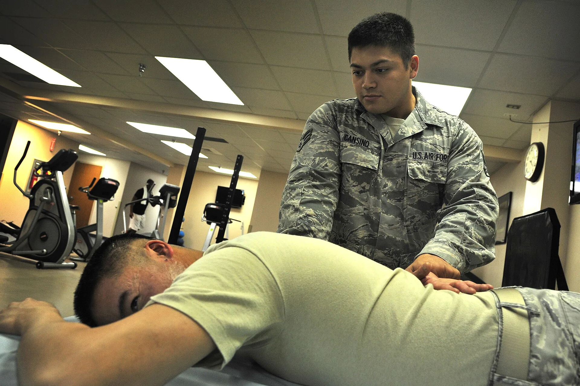 U.S. Air Force Senior Airman Agustine Cansino, 27th Special Operations Medical Operations Squadron physical therapy journeyman, stretches Staff Sgt. Zhong Gee’s arm, 27th Special Operations Maintenance Operations Squadron, at Cannon Air Force Base, N.M., June 5, 2012. Physical therapy strives to imp. Physical therapy rates that pay the bills and then some for owner-operators