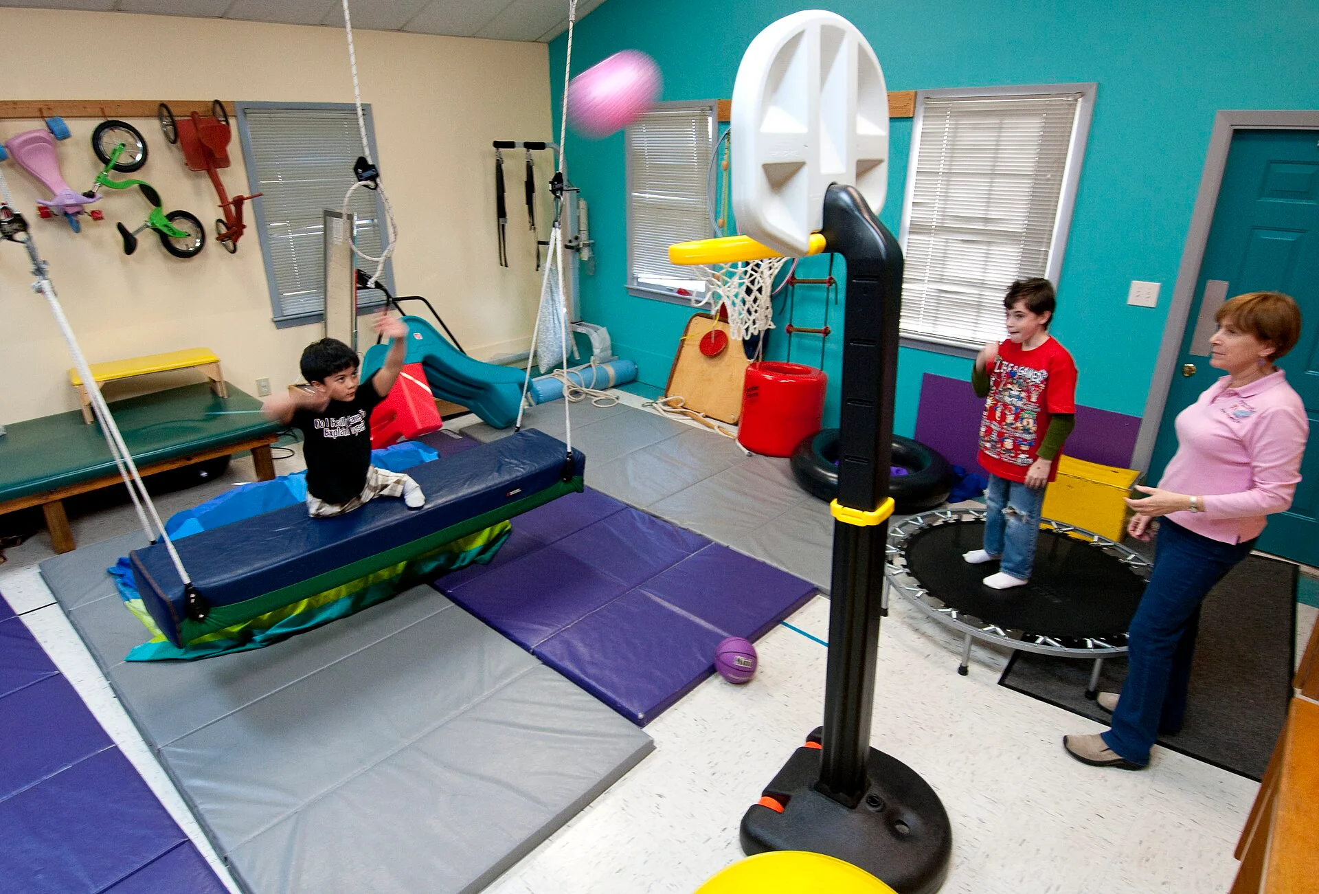 VIRGINIA BEACH, Va. (March 6, 2010) Ten-year-old Joseph Camano, left, exercises on a swing during a routine physical therapy session at the Diane Epplein & Assoc. Pediatric Therapy facility gymnasium while fellow patient nine-year-old Logan Flaathen, center, and occupational therapist Judy Anderson. What to measure every month in a physical therapy business for owner-operators