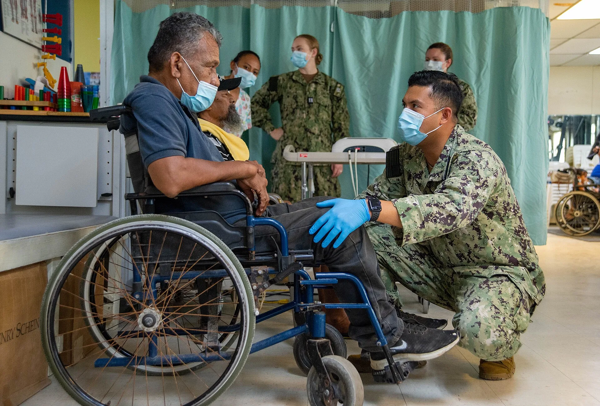 U.S. Navy Hospital Corpsman 2nd Class Roel Segarra, right, from Pago Pago, American Samoa, examines the leg of a Marshallese patient during a physical therapy clinic at Majuro Hospital in Majuro, Republic of the Marshall, as part of Pacific Partnership 2024-1 Nov. 3, 2023. Pacific Partnership, now i. What a physical therapy business must be licensed for