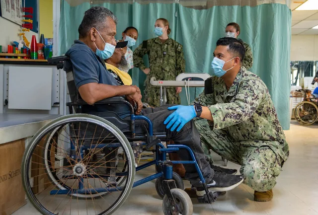 U.S. Navy Hospital Corpsman 2nd Class Roel Segarra, right, from Pago Pago, American Samoa, examines the leg of a Marshallese patient during a physical therapy clinic at Majuro Hospital in Majuro, Republic of the Marshall, as part of Pacific Partnership 2024-1 Nov. 3, 2023. Pacific Partnership, now i. What a physical therapy business must be licensed for